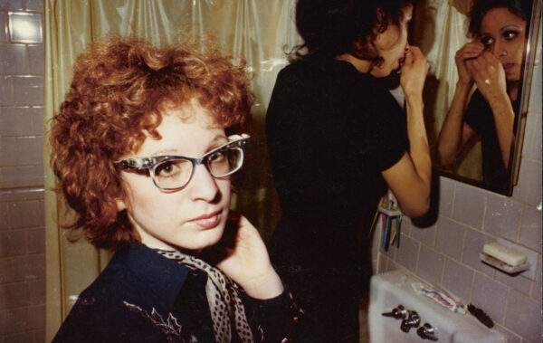 All the Beauty and the Bloodshed. Nan in the bathroom with roommate Boston. Courtesy of Nan Goldin