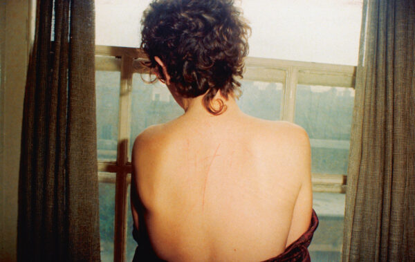 All the Beauty and the Bloodshed. Self-portrait with scratched back after sex, London 1978. Courtesy of Nan Goldin